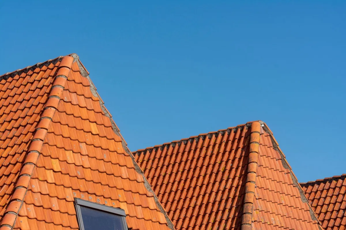 Clay barrel tile rooflines on homes in Overland Park, KS