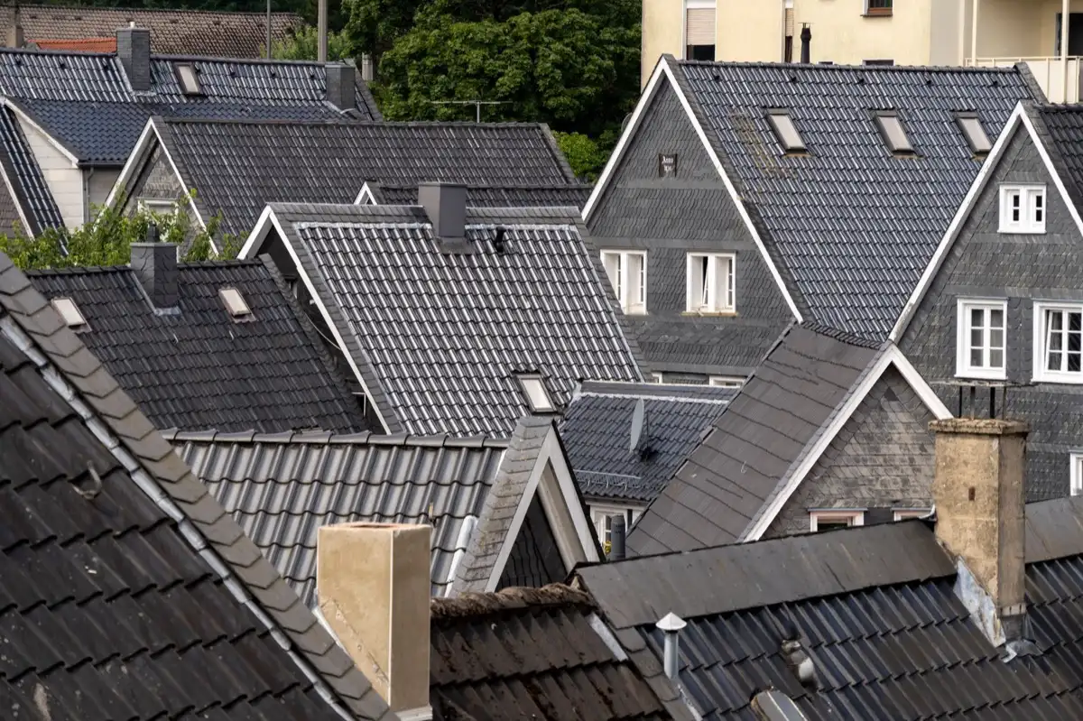 Steep roof eaves and gutter lines on houses in Overland Park, KS